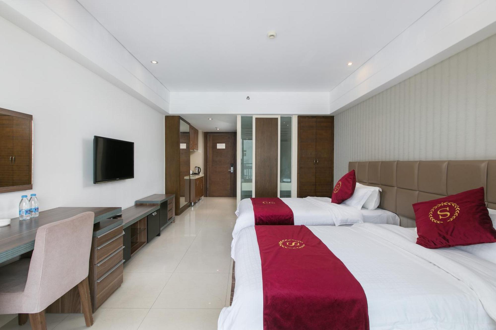 Aparthotel Sanya Sun And Sea Gueshouse Zimmer foto