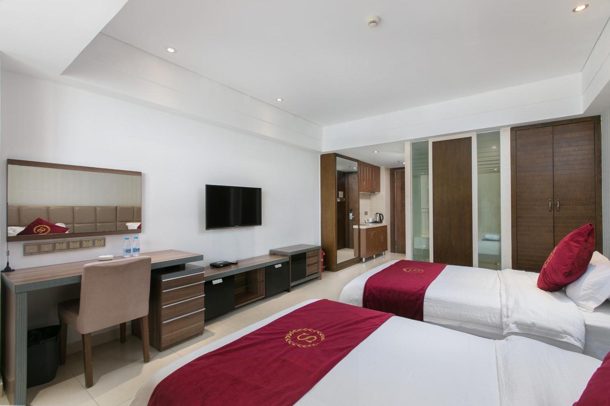 Aparthotel Sanya Sun And Sea Gueshouse Zimmer foto