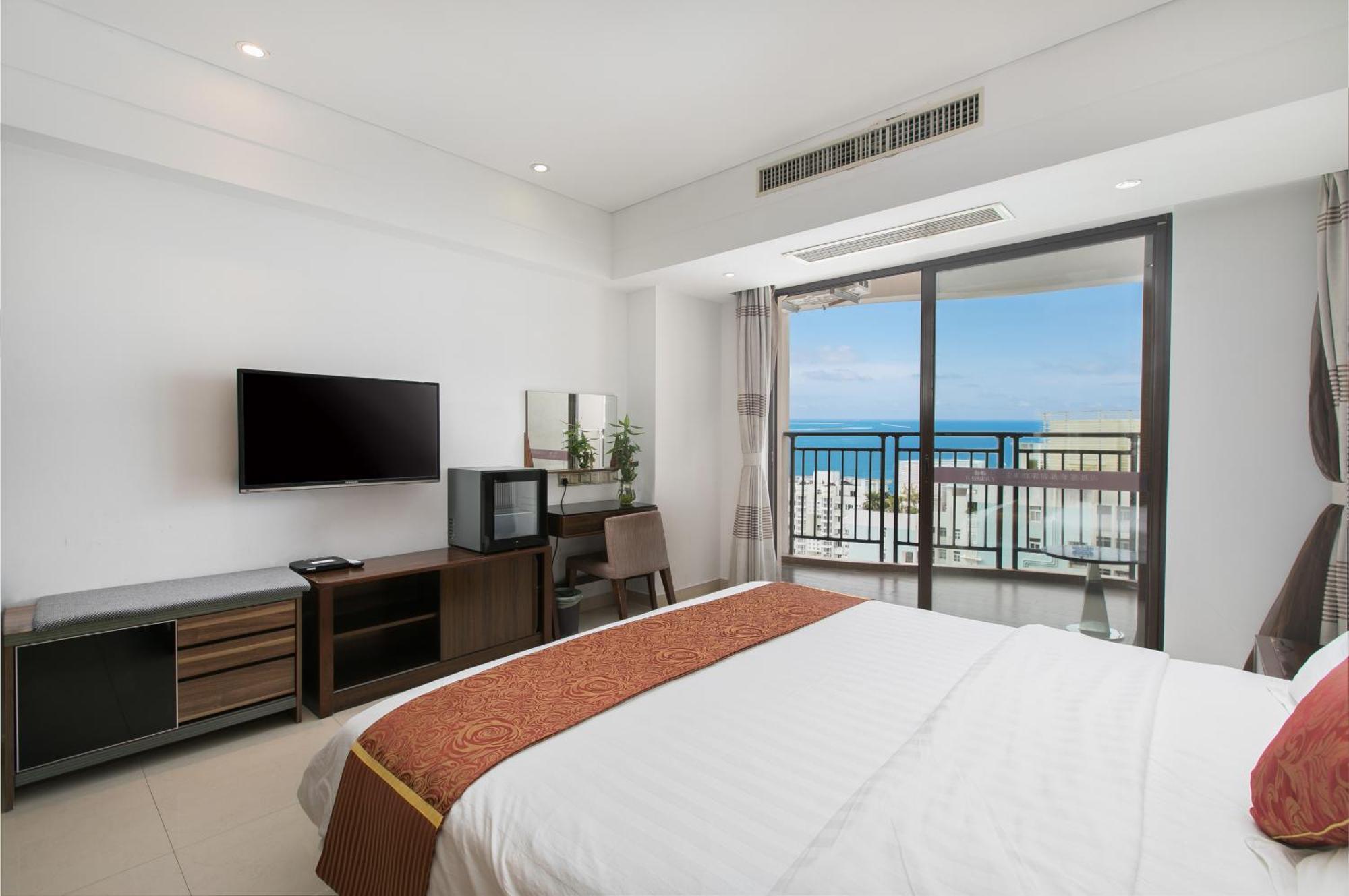 Aparthotel Sanya Sun And Sea Gueshouse Zimmer foto
