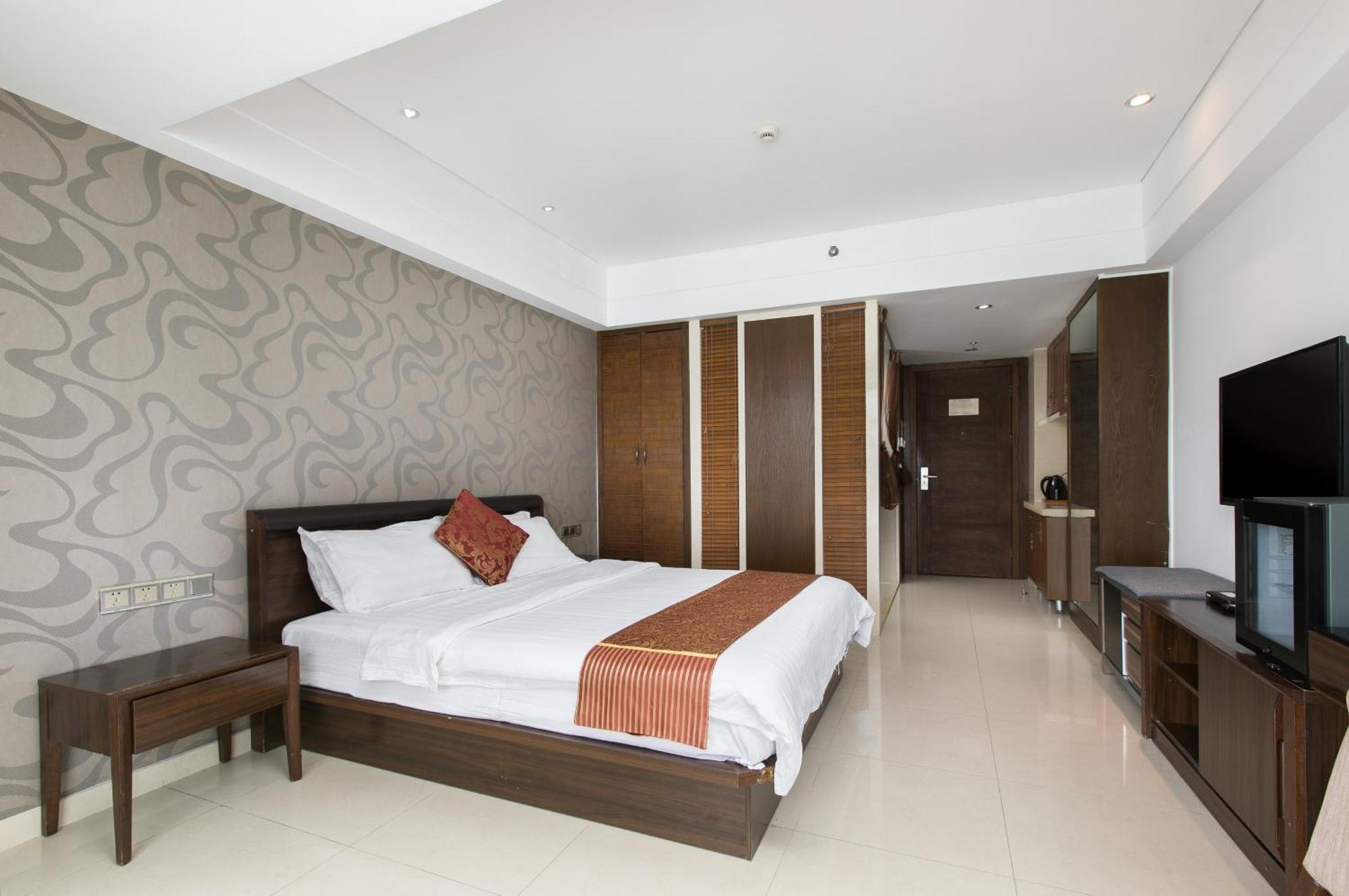 Aparthotel Sanya Sun And Sea Gueshouse Zimmer foto