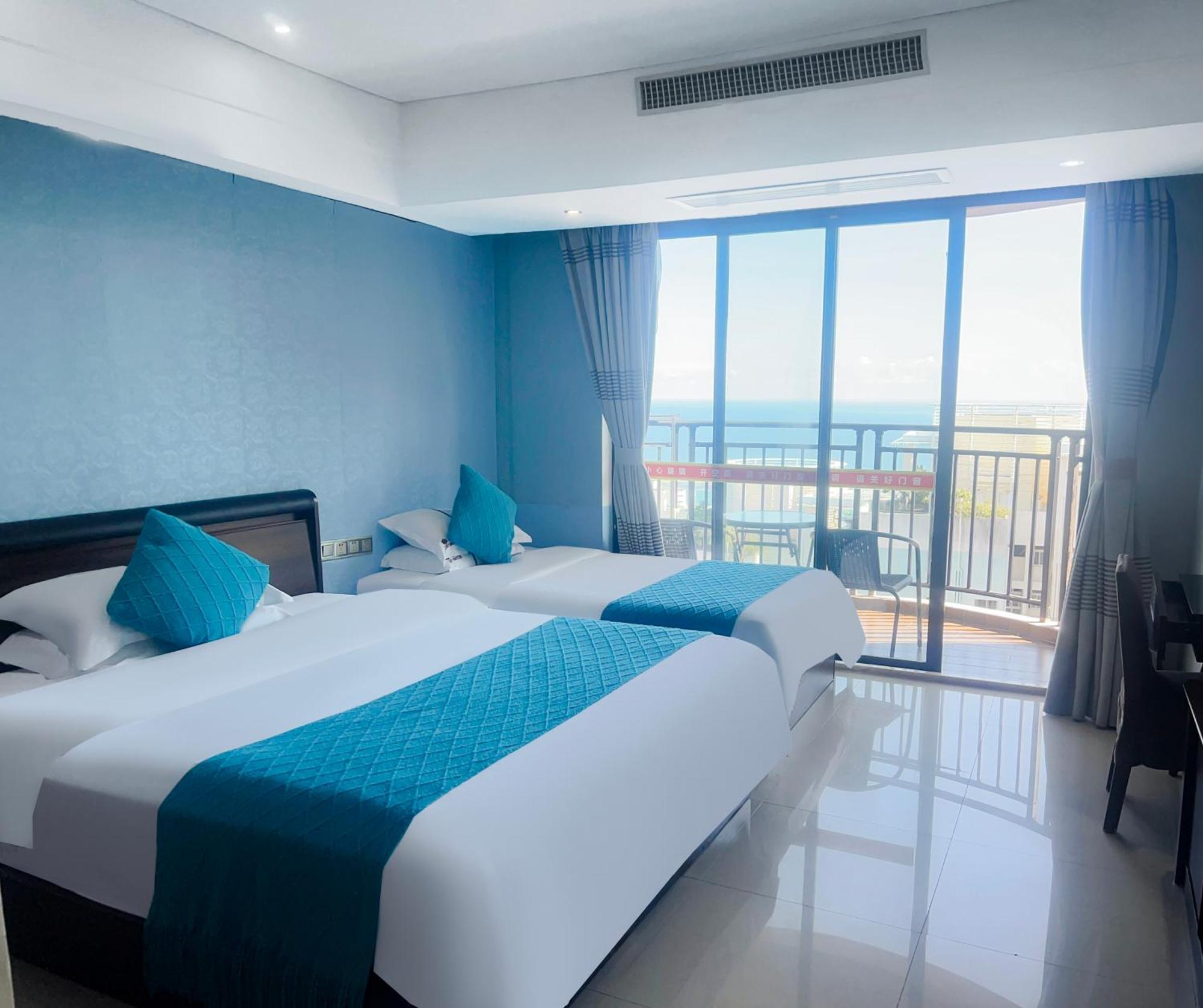 Aparthotel Sanya Sun And Sea Gueshouse Exterior foto